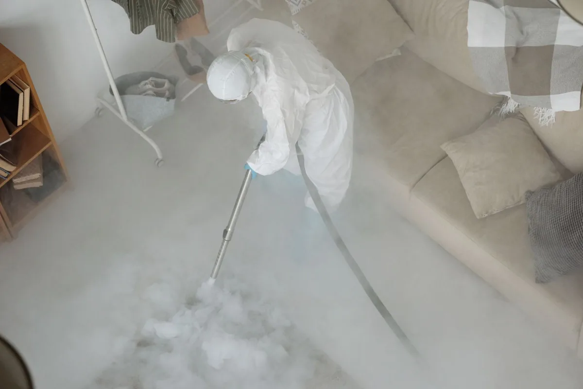 Biohazard cleanup technician in protective equipment, Fountainebleau, FL